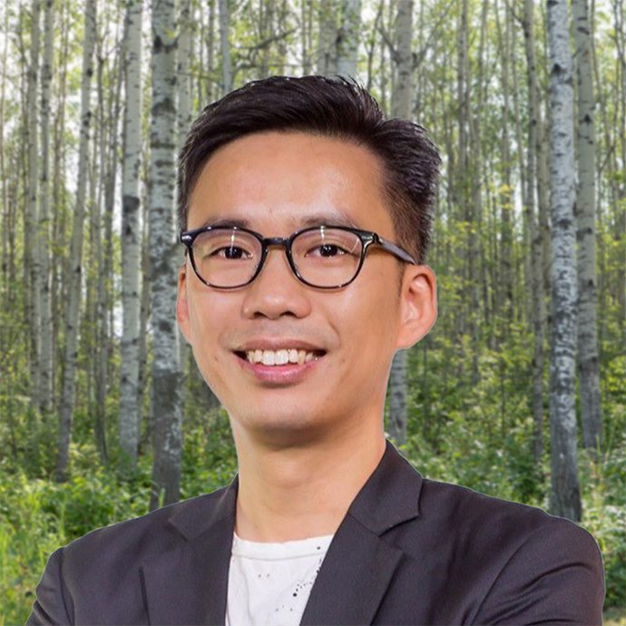 Man with trees background.